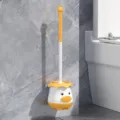 Cute cartoon duck toilet brush set with long handle and wall-mounted holder for bathroom cleaning. - Yellow