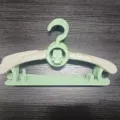 Foldable plastic baby clothes hanger with multi-layer design, anti-slip infant drying rack. - Green