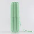 Portable striped toothbrush travel case, multifunctional storage cup with lanyard for outdoor use. - Green