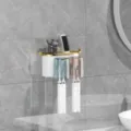 Wall-mounted toothbrush holder set with cups and storage shelf for modern bathroom organization. - Gold-Plated Toothbrush Holder [2 Slots]