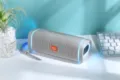 Tragbarer Bluetooth-Lautsprecher mit LED-Lichtern, Stoffgeflecht und kraftvollem Stereobass. - Grau