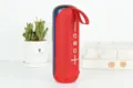 Mini haut-parleur Bluetooth portable avec connexion TWS, boîte de son en tissu sans fil pour voyage. - Rouge