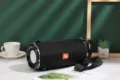 Portable fabric bluetooth speaker with dual diaphragms, heavy bass, and convenient strap for outdoor. - Black