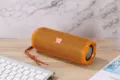 Tragbarer kabelloser Bluetooth-Lautsprecher mit Stoff-Design, starkem Bass und wasserdicht. - Gold