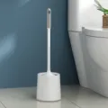 Grey and white toilet brush set with holder, long handle cleaning tool for bathroom. - Round Base / Bubble Bag Packaging / White
