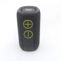 Close-up detail of the portable wireless bluetooth speaker showing fabric mesh and buttons. - Dark Gray