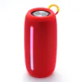 Tragbarer Bluetooth Lautsprecher mit vertikalem Licht, rotem Stoff und praktischer Handschlaufe. - Rot