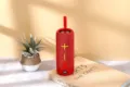 Tragbarer kabelloser Bluetooth-Lautsprecher mit Stoffdesign, TWS-Kopplung und Trageschlaufe. - Rot