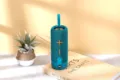 Tragbarer kabelloser Bluetooth-Lautsprecher mit Handschlaufe, Outdoor-Soundbox Detailansicht. - Lila