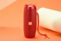 Haut-parleur Bluetooth sans fil portable avec basses riches et design cylindrique rouge vif. - Rouge