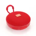 Tragbarer kabelloser Bluetooth-Lautsprecher in Rot mit praktischer Handschlaufe. - Rot