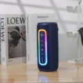 Portable bluetooth speaker with vibrant RGB ambient light, cylindrical wireless audio. - Blue