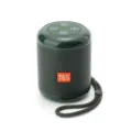 Altavoz Bluetooth inalámbrico portátil en verde oscuro con una práctica correa. - Verde