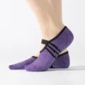 Non-slip purple yoga socks for women with cross straps and grip dots for pilates ballet. - One Size / Violet