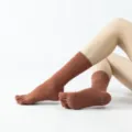 Brown five-toe yoga socks with anti-slip silicone grips, comfortable pilates socks for women. - One Size / Turning Red