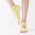 Women's anti-slip yoga socks with open back and five toes, featuring dotted soles for grip. - One Size / Egg Yolk Stone