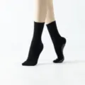 Black non-slip yoga socks for women and men, grip floor socks for pilates and fitness. - One Size / Black