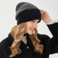Detail shot of the two-tone ribbed knit beanie worn by model, showing texture and fit. - M (54-58cm) / Dark Gray