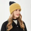 Detailed view of the cozy color-block knitted beanie hat, perfect for cold winter days and style. - M (54-58cm) / Yellow