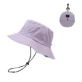 Purple quick-dry sun protection bucket hat with adjustable chin cord and packable design. - One Size / Purple