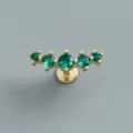 Macro detail of gold plated silver labret earring with five curved green zircons - Curved Green Zirconia Inlaid Style (EH1775) / 1PC / Gold