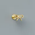 Macro view of minimalist gold bow earring with central zircon stone and flat back screw - Mini Bow Style (EH1772) / 1PC / Gold