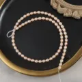 Perle d'acqua dolce naturali chicco di riso 4.5-5mm filo per creazione gioielli fai da te - Lunghezza del Filo Circa 38cm / Arancione Rosa Naturale