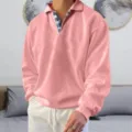Dettaglio di felpa polo rosa a maniche lunghe da uomo con colletto a quadri nella camera. - 3XL / Top / Rosa