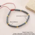 Bracciale regolabile da uomo in ematite nera con perline distanziatrici dorate. - Ematite (NAO08-8)