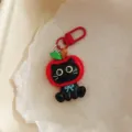 Close-up of cute black cat apple keychain pendant detail, creative bag accessory hanging ornament - Large Apple Black Cat - Black Cat