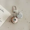 Cute simulated coconut food toy keychain bag charm with metal heart tag aesthetic accessory. - Brown Coconut Pendant