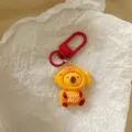 Cute capybara keychain detail, red metal clasp, adorable cartoon bag charm accessory. - New Year Capybara - Fish Head