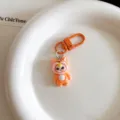 Cute cartoon character keychain detail, orange monster pendant for bags and backpacks charm. - 1 Piece / Orange
