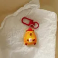Cute red capybara keychain detail shot, cartoon animal bag pendant and gift accessory. - New Year Capybara - Fortune