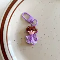 Detailed shot of the cute purple ethnic style girl keychain pendant accessory, fine workmanship. - Ethnic Style Girl / Purple