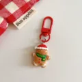 Cute Christmas gingerbread man keychain with red metal clasp, festive backpack pendant gift. - Gingerbread Man Style