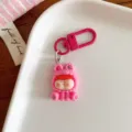 Adorable porte-clés personnage de dessin animé rose, accessoire de sac élégant et beau cadeau. - Rose rouge