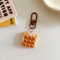 Adorable porte-clés pain capybara en résine pendentif pour sac à dos détail créatif - Style Grille à Neuf Touches / 1 Pièce/Paquet