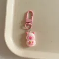 Cute pink capybara keychain detail, adorable resin cartoon animal pendant for bags and keys. - Strawberry Style / 1 Piece