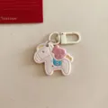 Cute cartoon horse keychain with money bag charm, perfect bag accessory and new year gift. - Beige Pony