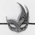 Venetian masquerade mask detail showing black and silver flame curved horn swan design. - Black and White
