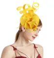 Yellow sinamay fascinator detail, feather hair accessory closeup, elegant wedding party hat - Yellow