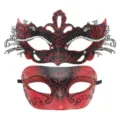 Detail view of couple masquerade masks featuring metal butterfly and red glitter designs. - Couple Mask Set / Dual-color Red