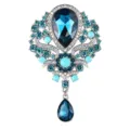 Spilla con ciondolo a goccia in cristallo blu stile palazzo vintage per cappotto da donna. - Blu lago
