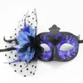 Detail view of the black masquerade mask with blue glitter swans and mesh flower - Polka Dot Mesh + Flower Swan Style (20250303mj005) / Blue