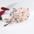 Elegant rose flower brooch pin featuring sparkling rhinestones and pink cat's eye stones. - xz4457 Rose Gold