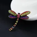 Exquisite crystal dragonfly brooch detail shot, vintage metal finish with colorful rhinestones. - Vintage Dragonfly Brooch (xz4519)