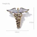Broche Caduceo vintage de aleacion esmalte blanco alas de angel simbolo medico insignia - Estilo Alas de Serpiente (xz4084) / Broche Alas de Ángel Oro Antiguo