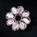 Exquisite round flower brooch featuring white cat's eye stones and sparkling rhinestones. - Round Flower Brooch (xz4397) / Rose Gold