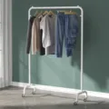 White metal clothing rack with wheels, freestanding garment display rail for home and bedroom use. - L60 H135 with Wheels / Thick White